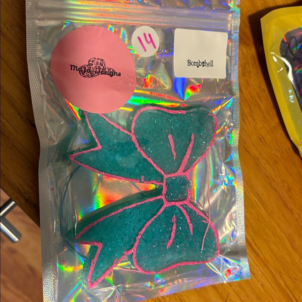 Teal and Pink Bow car freshie in the scent bomb shell 😍